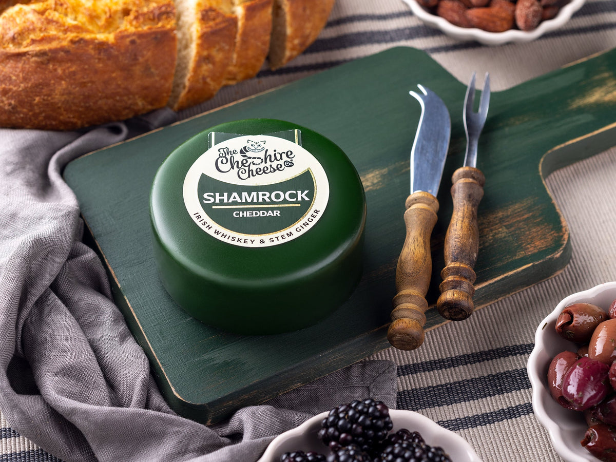 Shamrock Irish Whiskey and Stem Ginger Cheddar waxed cheese truckle