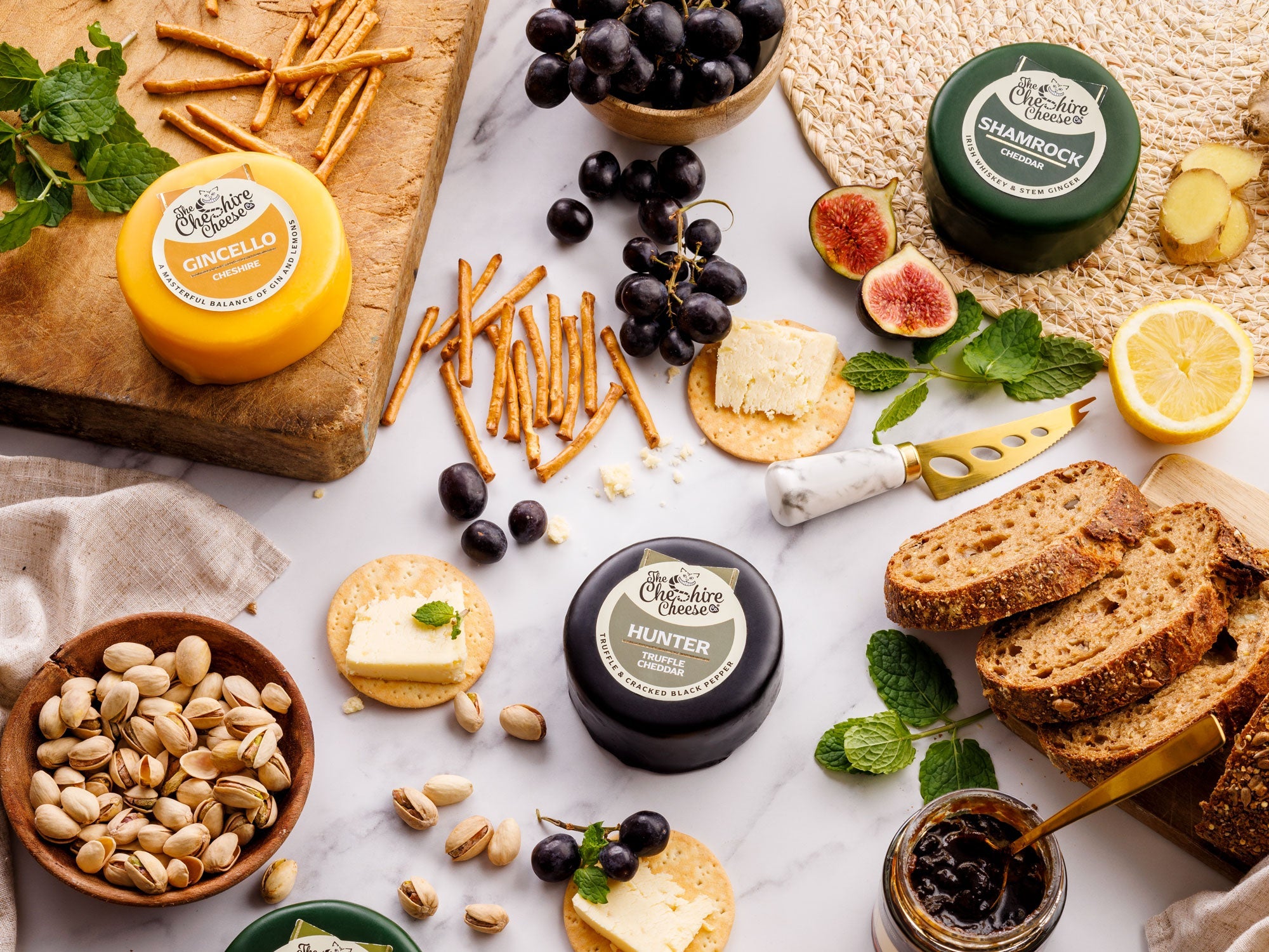Spring cheese hamper with waxed truckles, chutney and biscuits for cheese