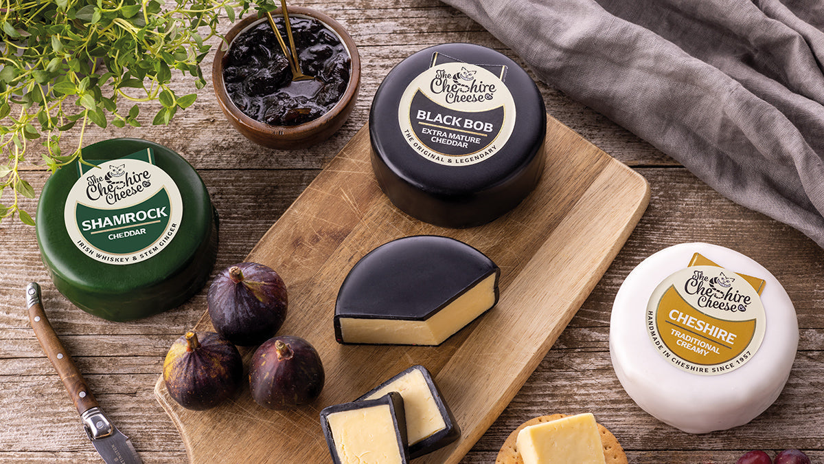 Cheddar and Cheshire on a Cheeseboard