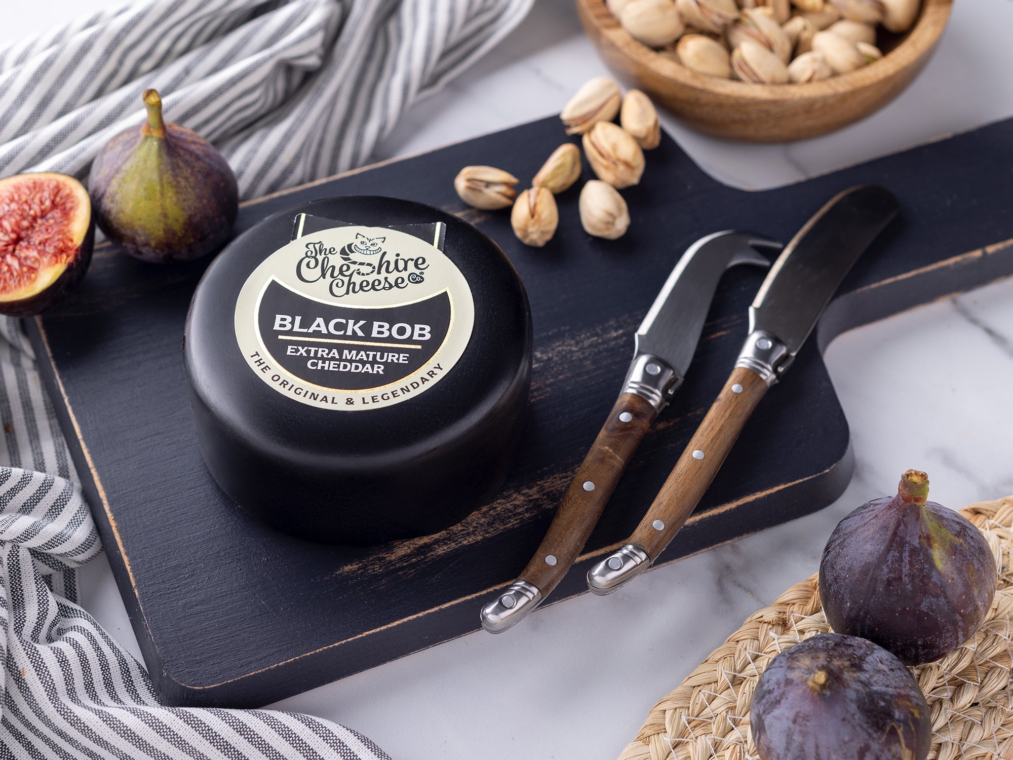 Black Bob Extra Mature Cheddar waxed cheese truckle