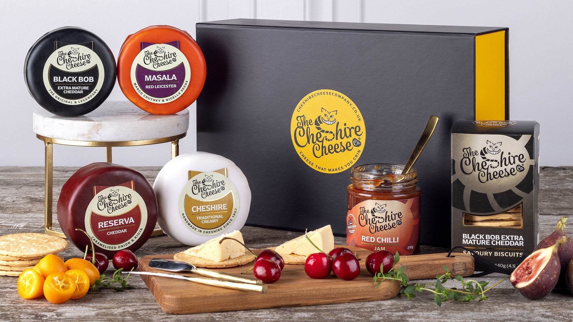 Cheese and chutney hamper with waxed truckles and jars of chutney